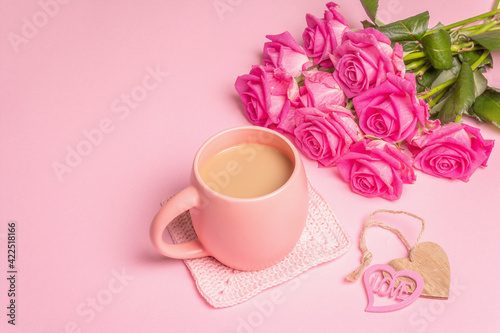 Morning coffee with a beautiful bouquet of roses