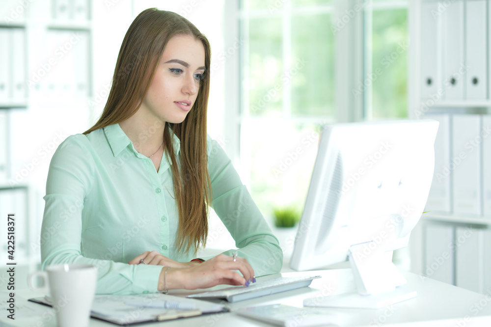 Portrait of businesswoman working in office Portrait of businesswoman working in office
