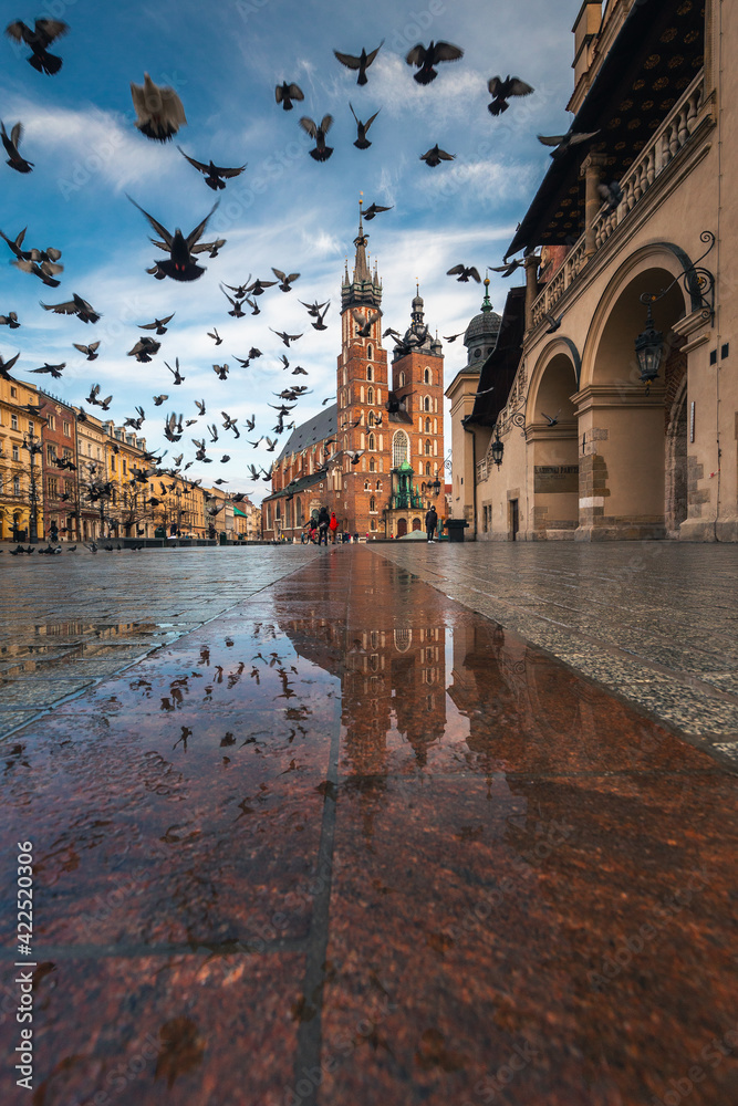 Fototapeta Krakow old town photographed in March. Dynamic weather created interesting conditions for shooting.
