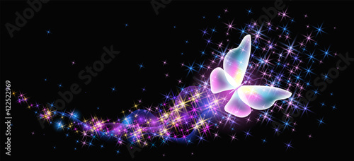 Flying butterfly with sparkle and blazing trail flying in night sky among shiny glowing stars in cosmic space. Animal protection day concept.
