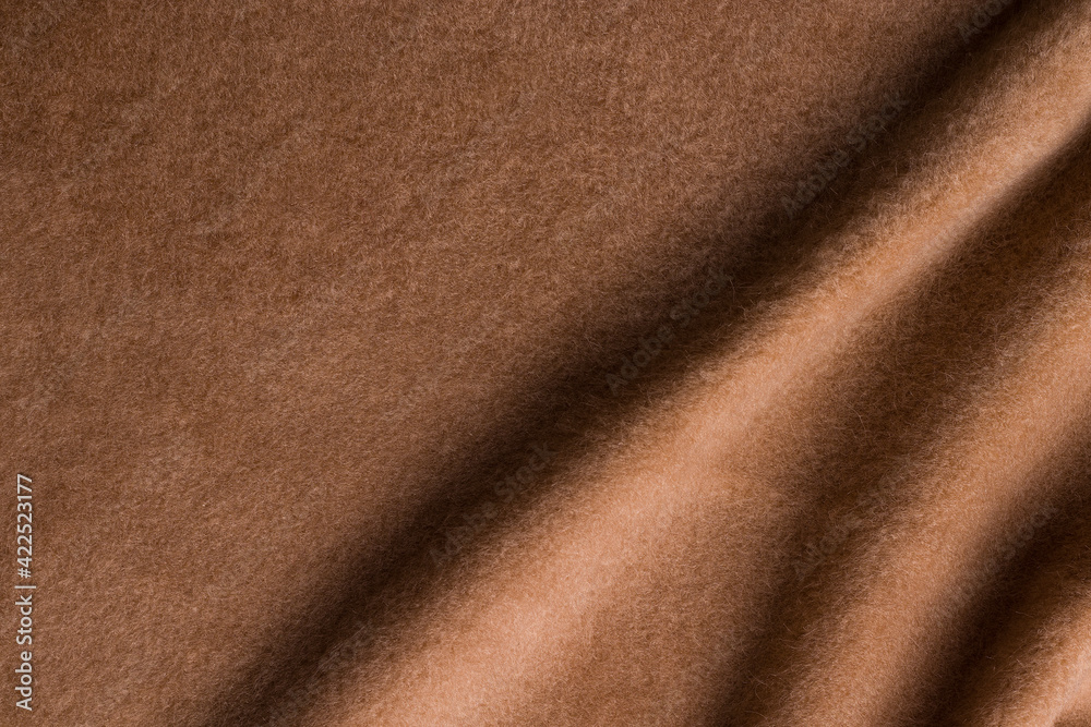Background texture. Brown alpaca wool fabric