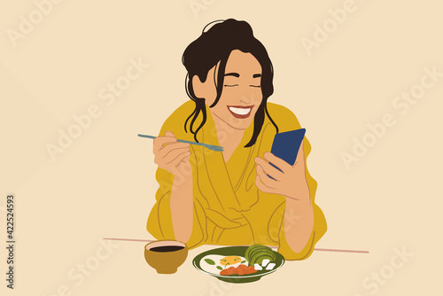 Pretty woman in yellow bathrobe enjoys breakfast in the morning, eating eats fried egg with avocado and fish and coffee while using a phone. Vector illustration. Healthy diet concept.