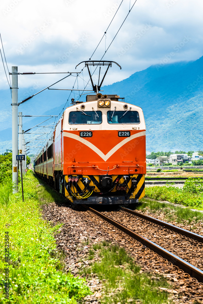 the train passes through the countryside of Taitung, Taiwan