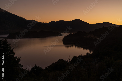 sunset landscape with lake and mountains