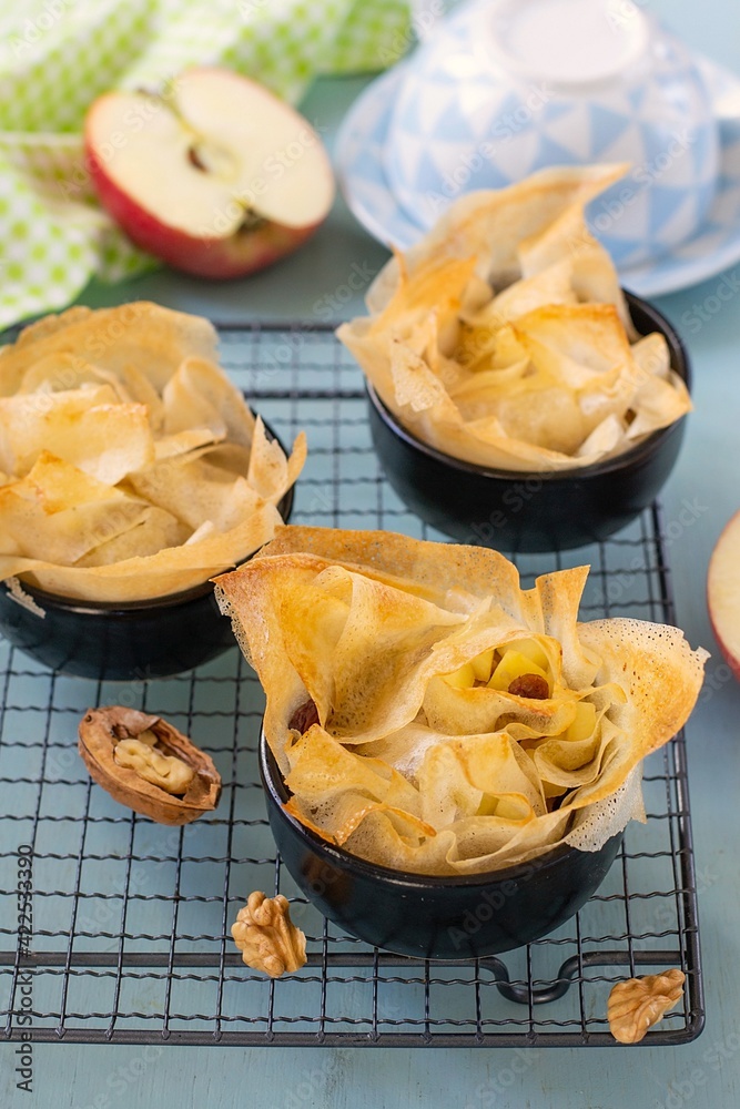 Pastry made of filo dough stuffed with apples, cinnamon, walnuts and raisins. Pastry made of filo dough stuffed with apples, cinnamon, walnuts and raisins.