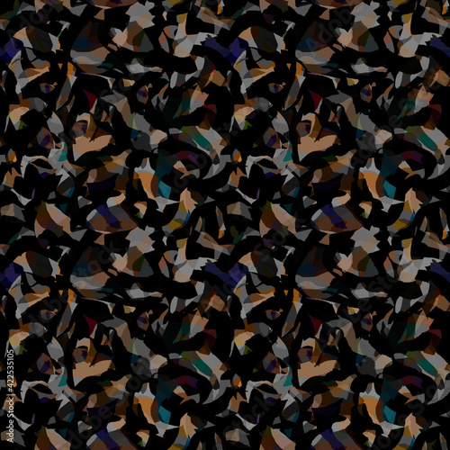 Seamless abstract geometric camouflage pattern on a black background. Intertwined fancy shapes from jagged brush strokes and color spots. For youth and sportswear, textiles, fabrics, t-shirts, print