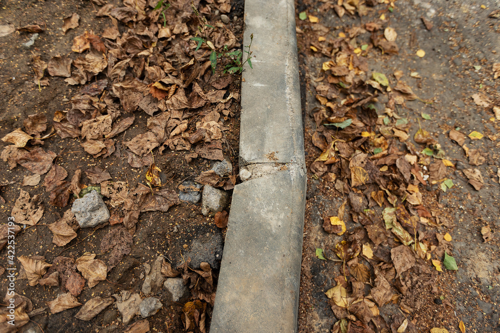 custom made wallpaper toronto digitalpoorly executed road repairs. replacing the old curb stone with a new one