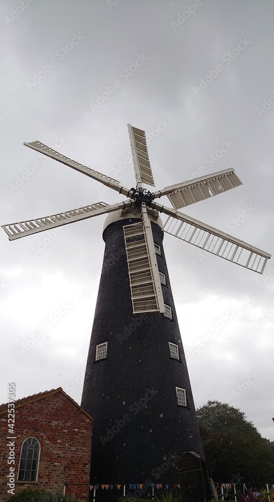 Windmill in British countryside 