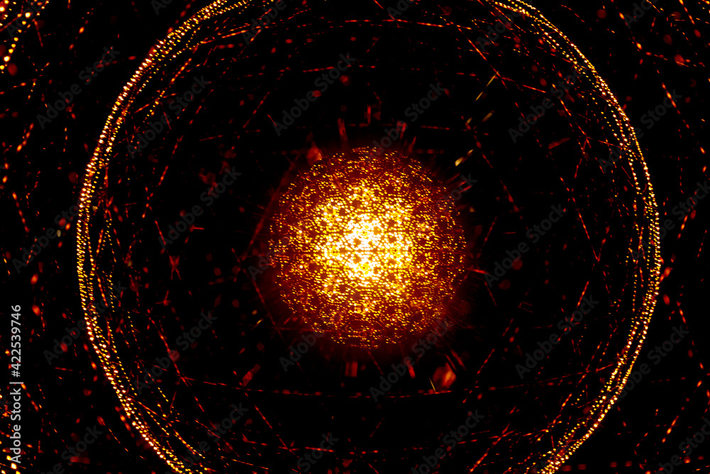abstract background - a glowing mesh sphere of orange defocused lights ...