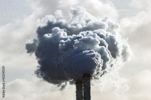 Fotografie, Obraz Smoking chimney pipes of a electro power station plant  causing air pollution