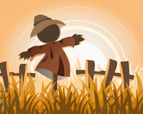 Scarecrow and rice field with sunset countryside landscape