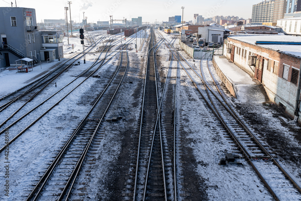 train tracks in ulaanbaatar, mongolia on a winter day 