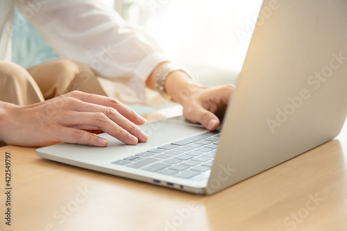 work using computer hand typing laptop keyboard contact us.student study learning education online.adult professional people chatting search at office.concept for technology device business