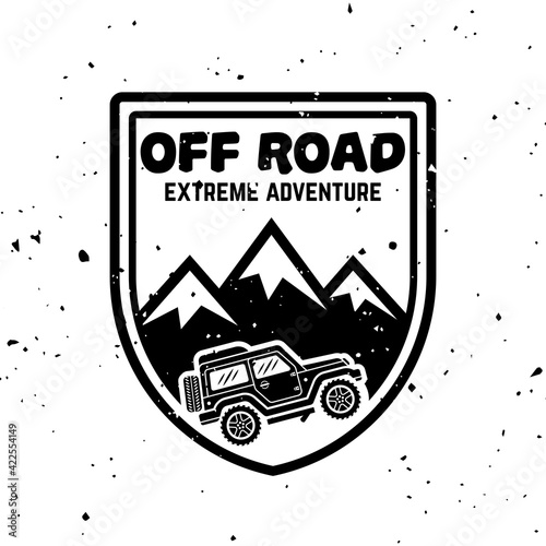 Off-road car and mountains vector monochrome vintage emblem, label, badge or logo isolated on white background