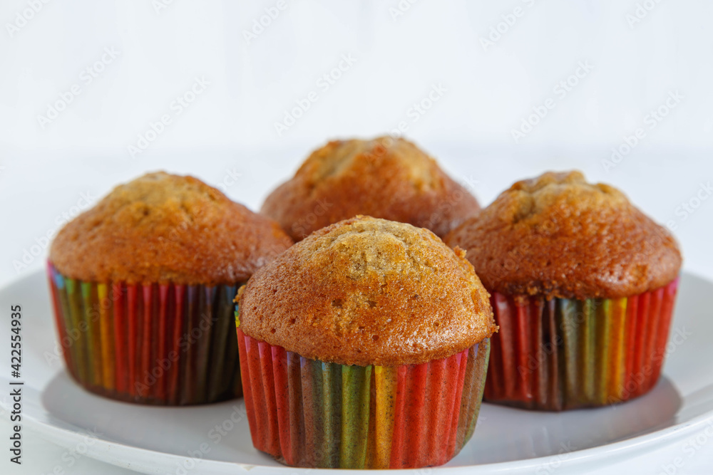 Home made cupcakes menu on white wooden table Home made cupcakes menu on white wooden table