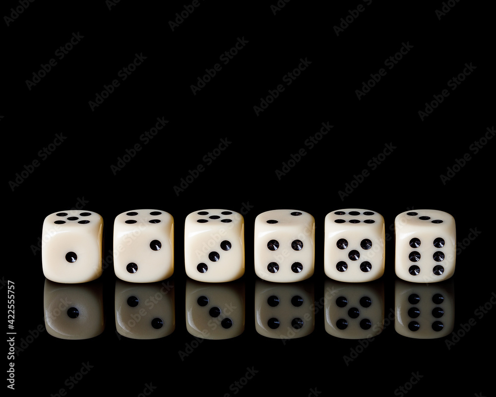 dice with reflection on black background, copy space dice with reflection on black background, copy space