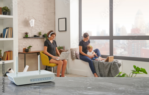 Modem and router box close up on the table style, decorative living room blue concept background.