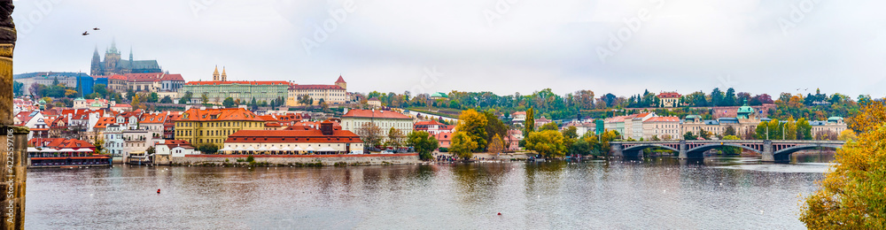Panorama Prague Czech Republic view from Charles Bridge to river and city, autumn season