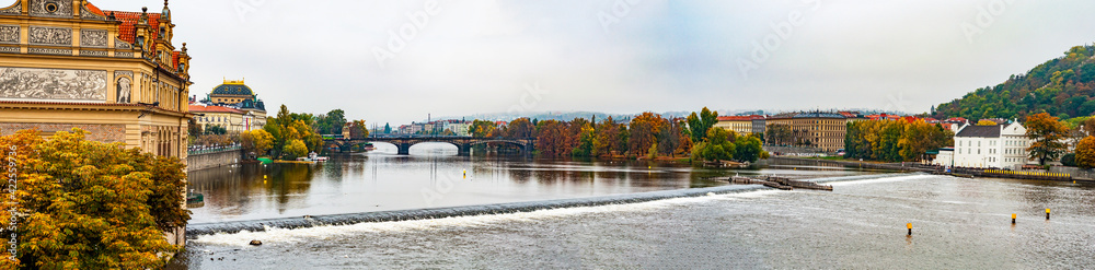 Panorama Prague Czech Republic view from Charles Bridge to river and city, autumn season