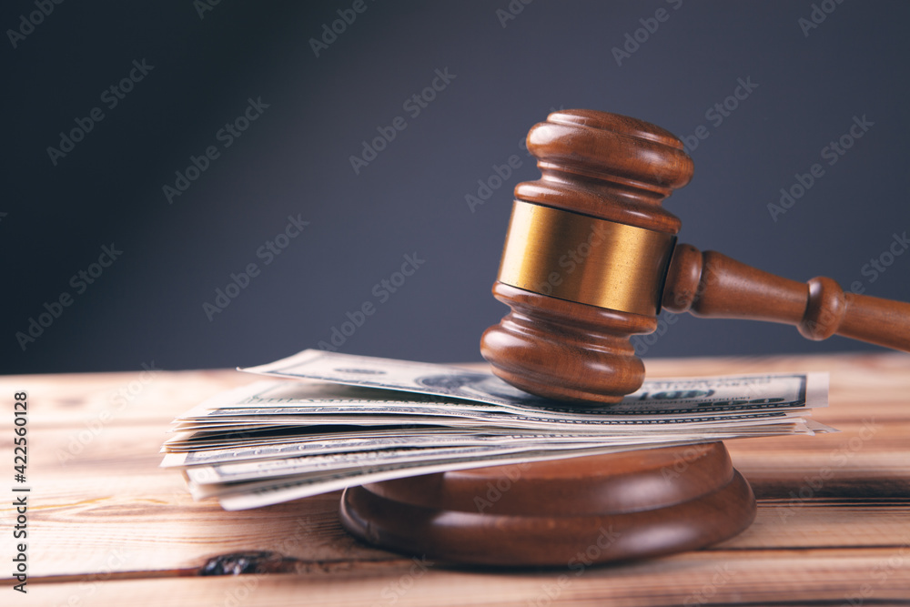 Hammer and money in court. Hammer and money in court.