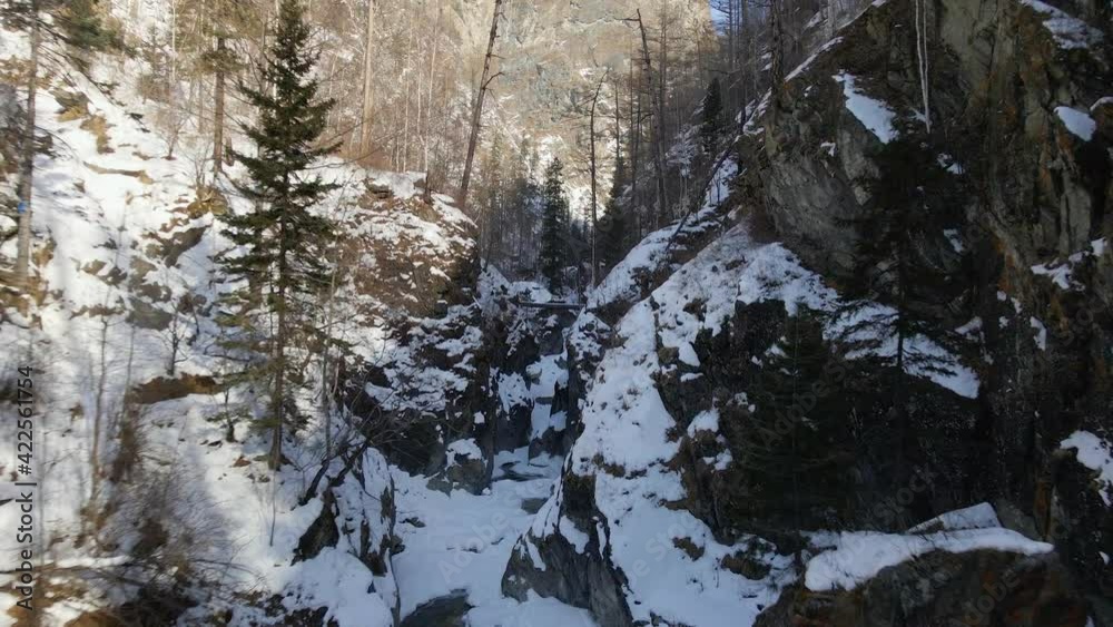 Deep Gorge in Winter. River Canyon Covered with Snow. Aerial View Deep Gorge in Winter. River Canyon Covered with Snow. Aerial View
