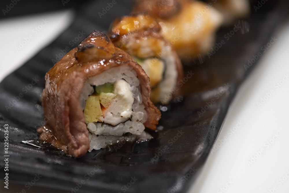 Beef maki sushi on top with foie gras