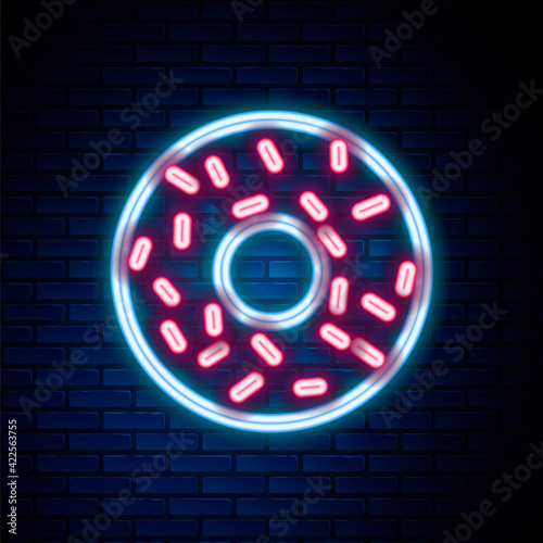 Glowing neon line Donut with sweet glaze icon isolated on brick wall background. Colorful outline concept. Vector