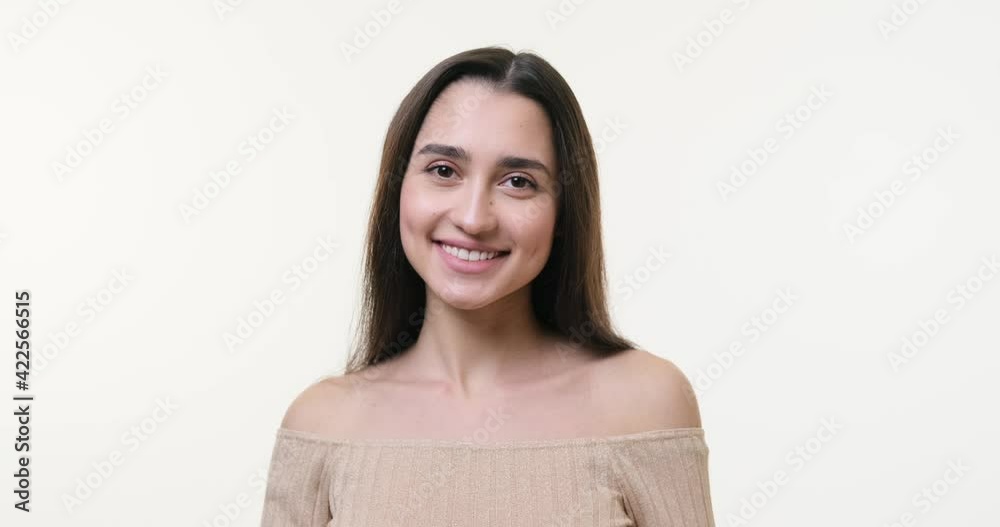 Beautiful woman smiling over white background Beautiful woman smiling over white background
