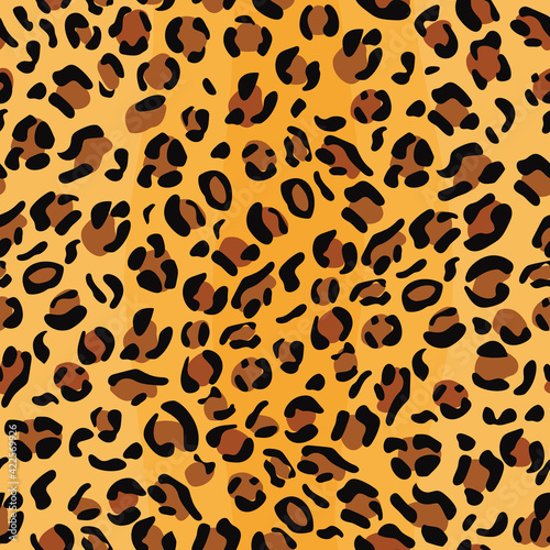 Leopard skin seamless pattern. Jaguar, cheetah texture. Bright abstract wild cat animal background. Vector