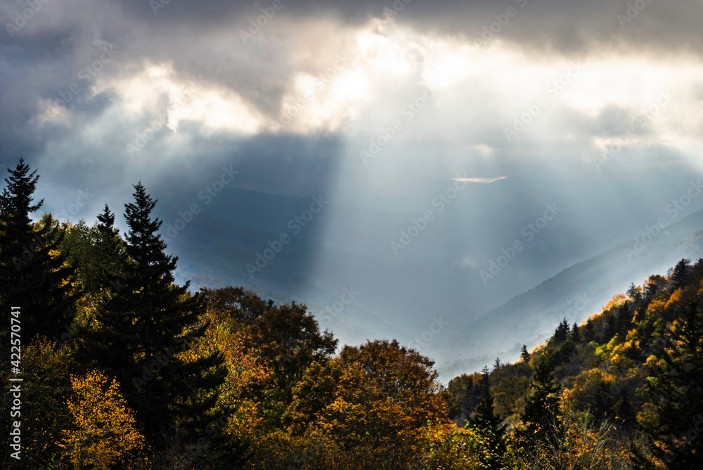 Sun streaks on the mountain top in the Great Smoky MOuntains.