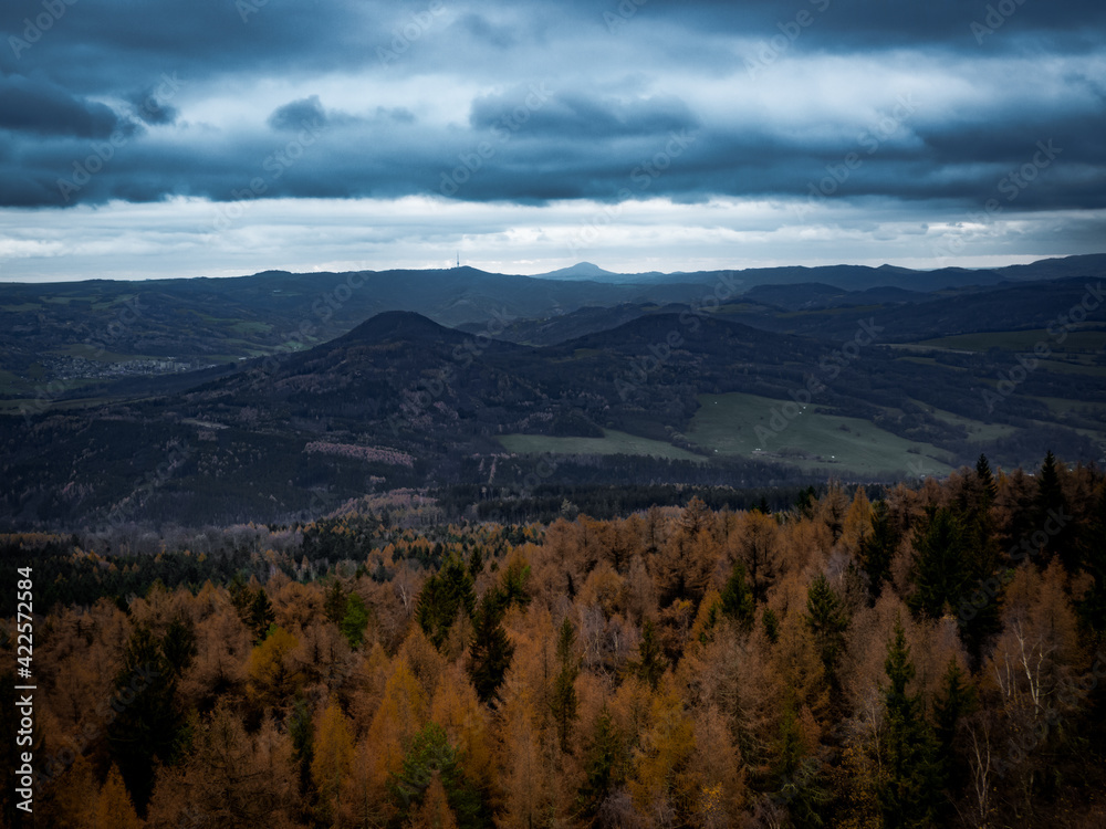 Amazing dark scenery and view to the deep valleys from top of mountains in north of Czech Republic.