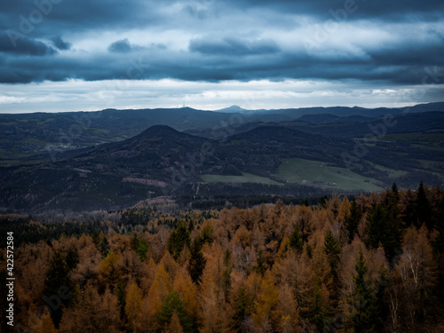 Amazing dark scenery and view to the deep valleys from top of mountains in north of Czech Republic.