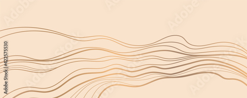 Golden curve line on sandy color background.
