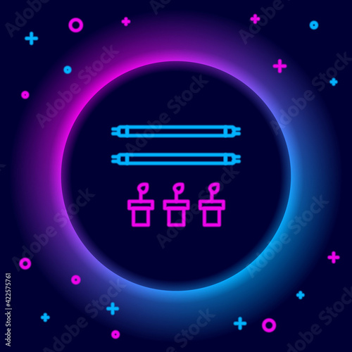 Glowing neon line Smart farm with light bulb and plant symbol icon isolated on black background. Colorful outline concept. Vector