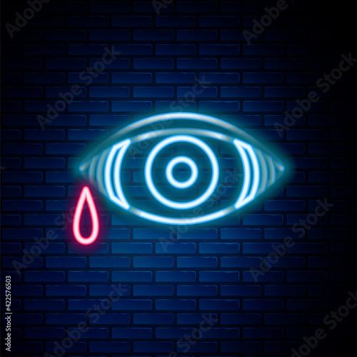 Glowing neon line Reddish eye due to viral, bacterial or allergic conjunctivitis icon isolated on brick wall background. Colorful outline concept. Vector