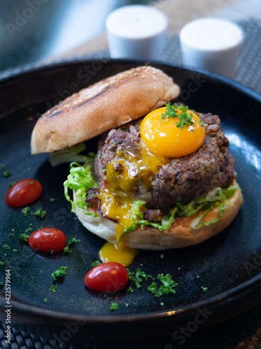 Western Menu - Steak Tartare with burger and egg yolk
