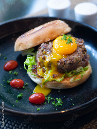 Western Menu - Steak Tartare with burger and egg yolk