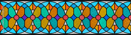 Colored stained glass window. Art Nouveau interior design style. Abstract stained-glass background. Bright colors, colorful. Modern stained glass. Expression of color. Vintage. Seamless pattern. 