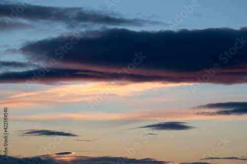 Cloud formation in warm colors at dusk. Shot in Sweden  Scandinavia.