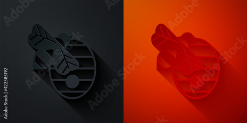 Paper cut Hive for bees icon isolated on black and red background. Beehive symbol. Apiary and beekeeping. Sweet natural food. Paper art style. Vector