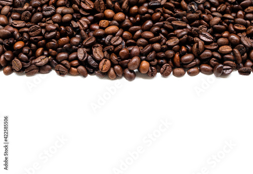 Coffee beans background from the dark roasted coffee with the white background.