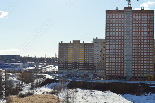construction of a high-rise building on a sunny day
