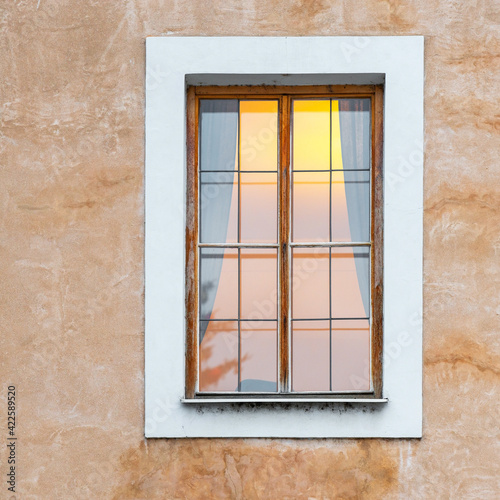 Romanesque style architecture facade with window and interior atmosphere light, Prague city, Czech Republic. © SL-Photography