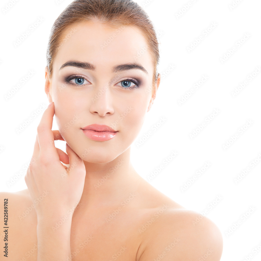 Portrait of beautiful calm woman with young clean healthy skin, studio shot isolated on white background. Anti-aging and beauty treatment. Portrait of beautiful calm woman with young clean healthy skin, studio shot isolated on white background. Anti-aging and beauty treatment.