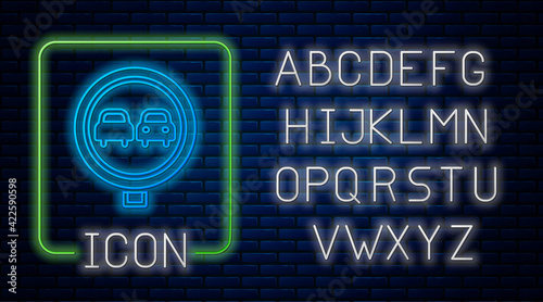 Glowing neon No overtaking road traffic icon isolated on brick wall background. Traffic rules and safe driving. Neon light alphabet. Vector