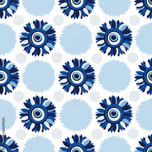 Turkish amulet against the evil eye in the form of a sunflower. Seamless pattern with flowers in blue tones for printing on decorative textiles, fabrics, paper. 