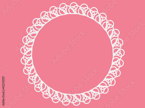 Lace round frame on a pink background. Element for postcard design, photo decoration or interior decoration.