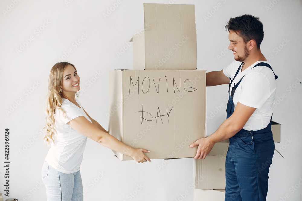 Woman moving and using a boxes Woman moving and using a boxes