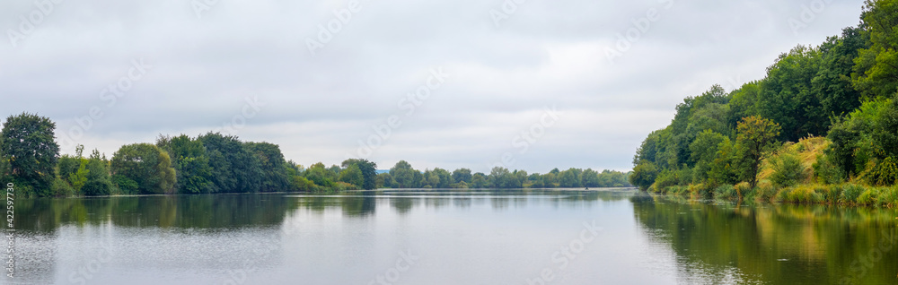 Forest on the river in early autumn, panorama Forest on the river in early autumn, panorama