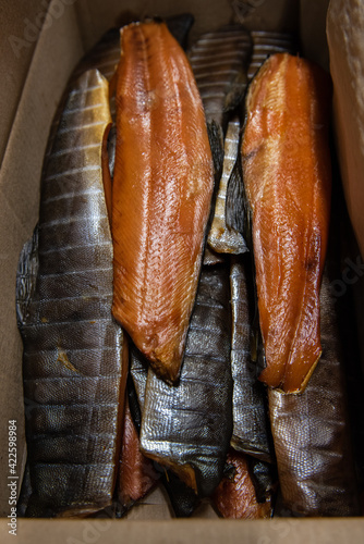 Smoked fish in craft paper ...